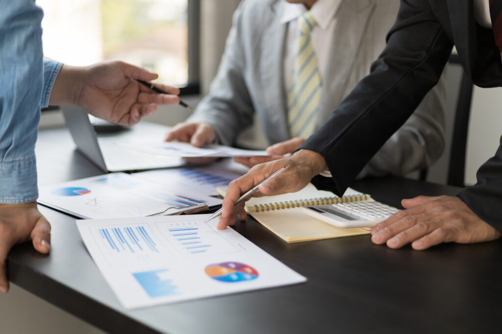 Meeting business people brainstorming ideas for business strategy planning design.